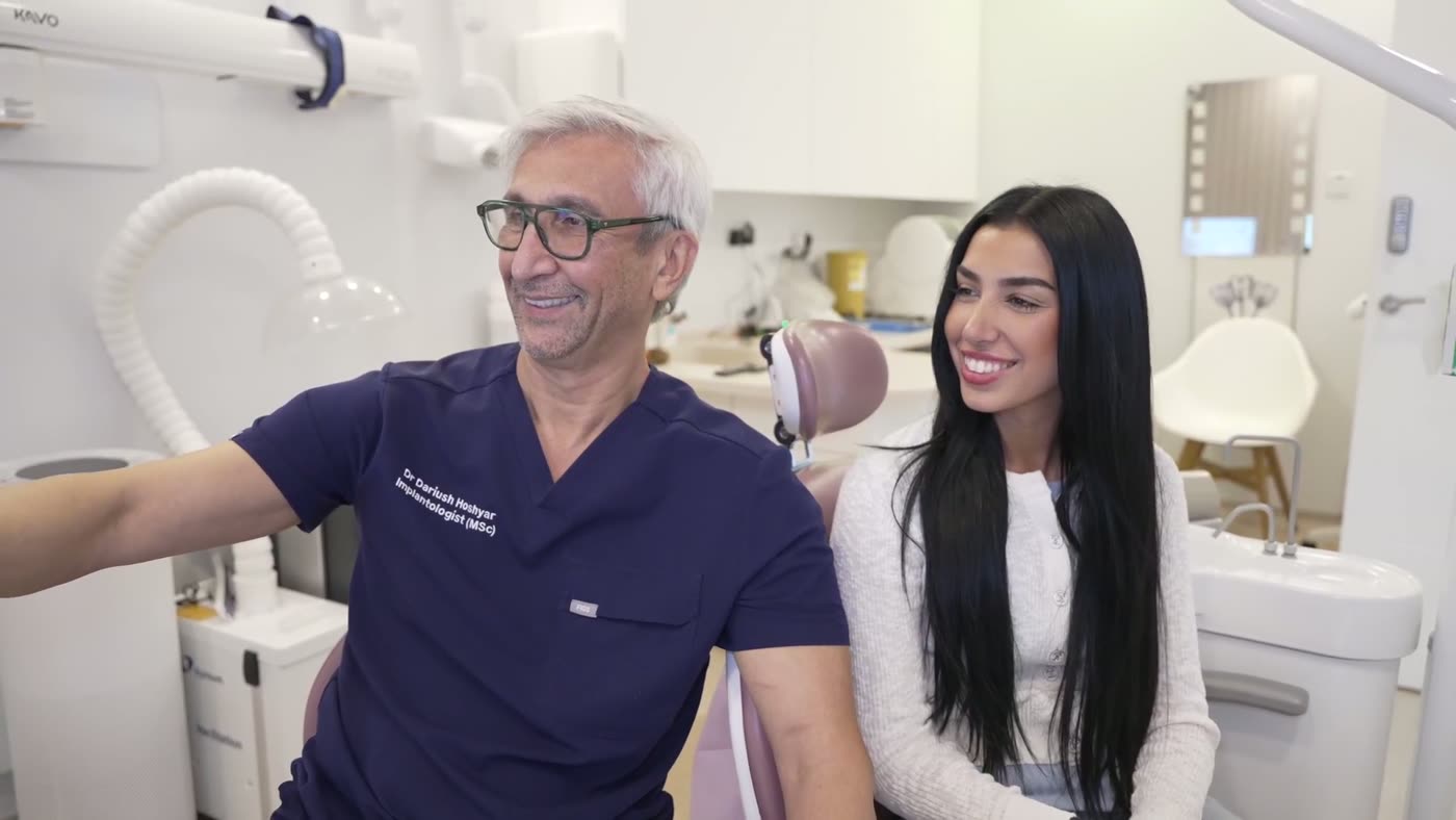 Dentist and patient discussing cosmetic options